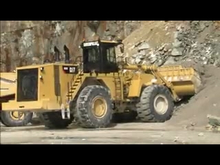 AFTER >: CAT 992K Wheel Loader Safety Features